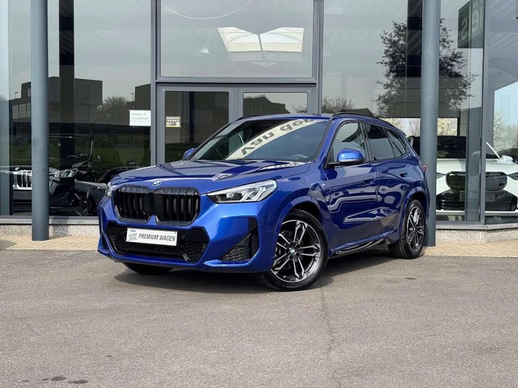 BMW X1 sDrive18i M Sport / PANODAK / TREKHAAK / DODE HOEK, Auto's, Gebruikt, Zwart, Leder, Bedrijf