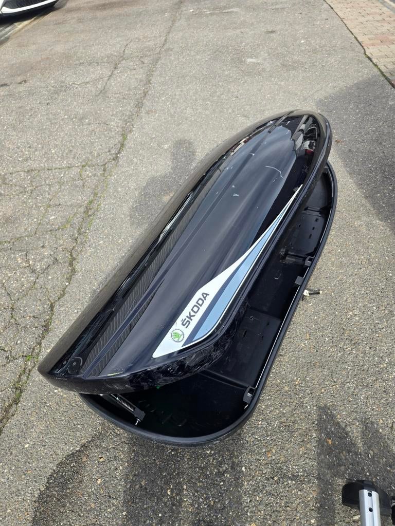 Dakkoffer van 380 liter, Ophalen
