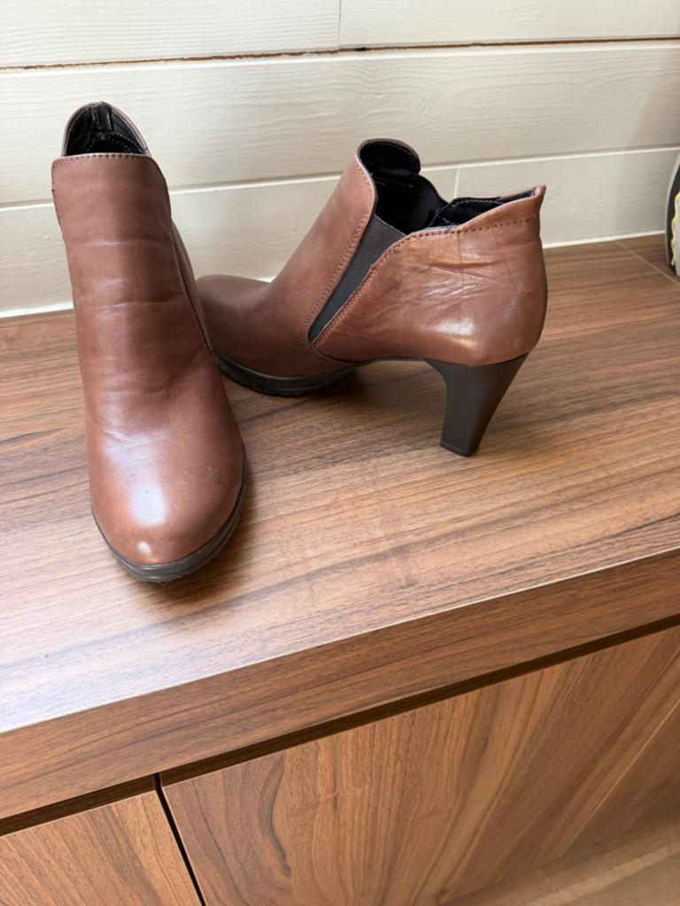 Schoenen, Enlèvement, Comme neuf