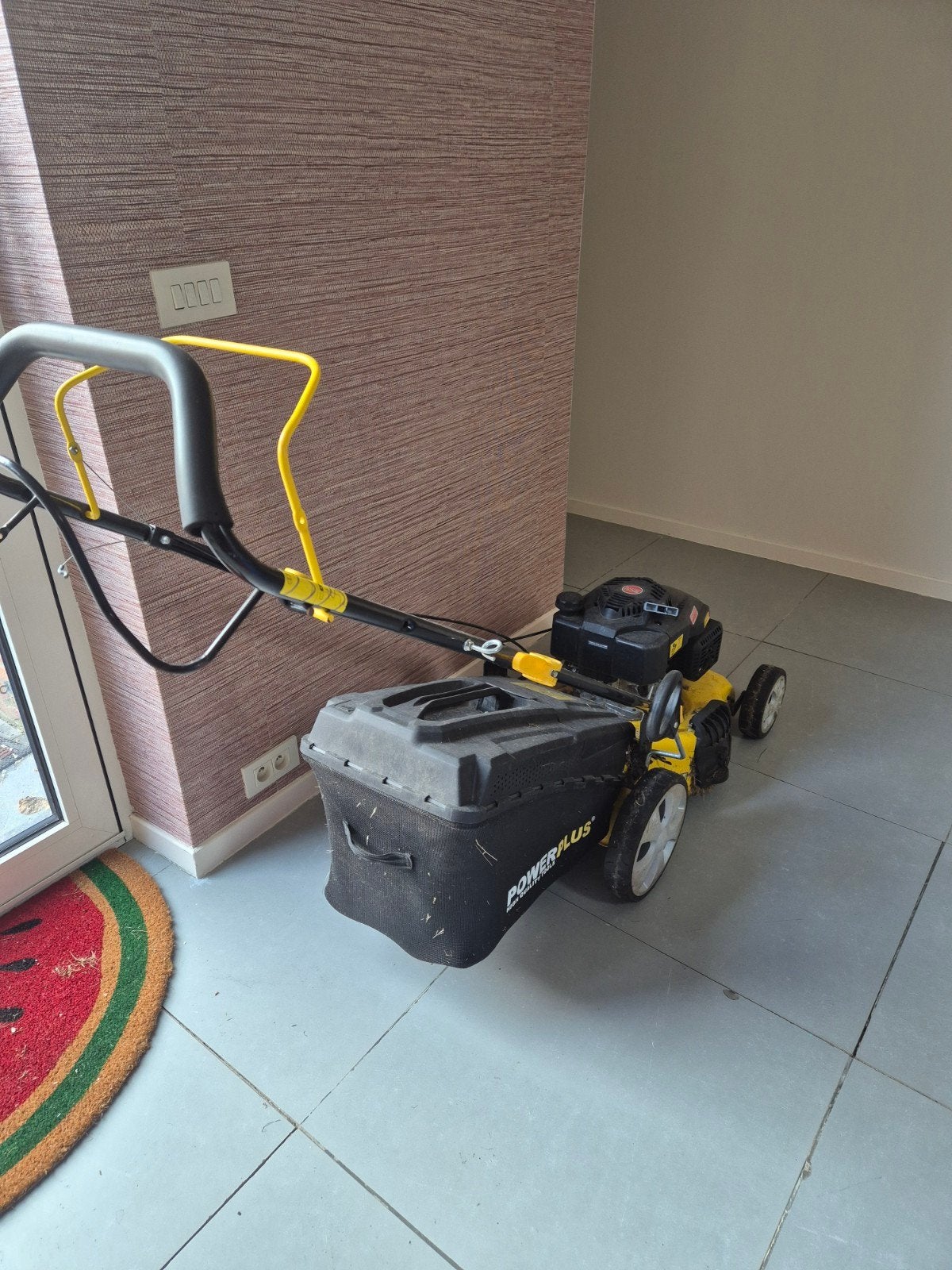 Grasmachine op benzine, Enlèvement