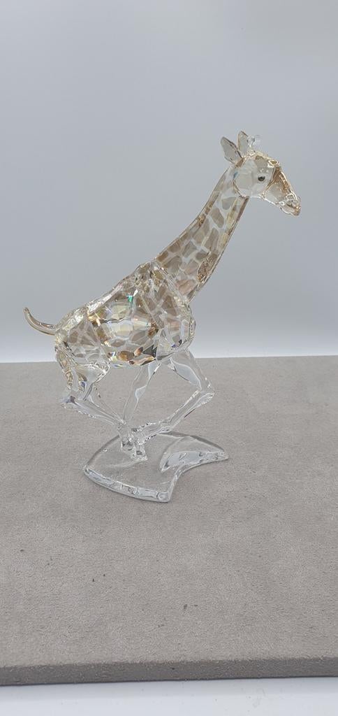 Swarovski Giraf lopend., Enlèvement