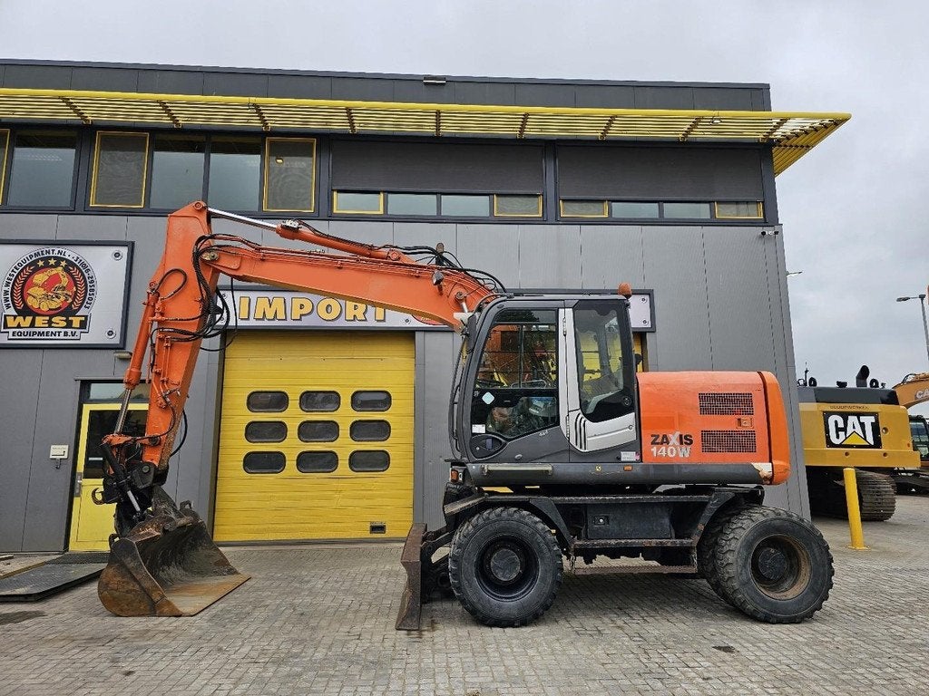 Hitachi ZX140W-3 WE1646, Excavatrice