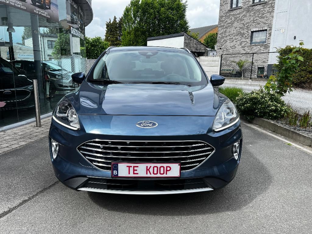 Ford Kuga Plug-in Hybride PHEV 2.5 Ecoboost Fwd Titanium, Auto's, Stof, 4 cilinders, Blauw, Bedrijf