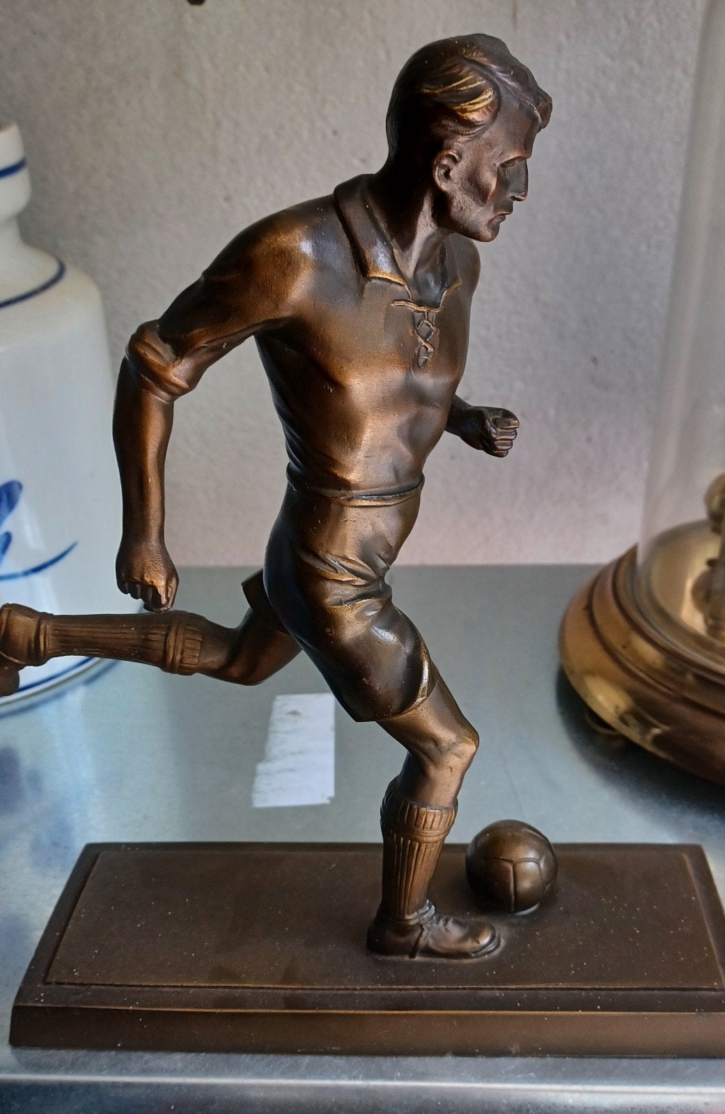 Vintage  bronzen voetballer, Ophalen