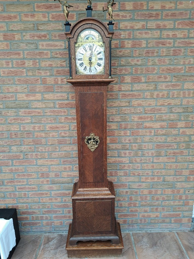 Antieke Warmink staande klok, Ophalen