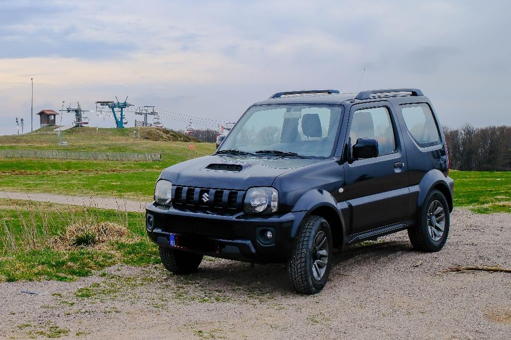 Suzuki Jimny 4x4 1.3 jlx, Auto's, Suzuki, Stof, 63 kW, 4 cilinders, Zwart