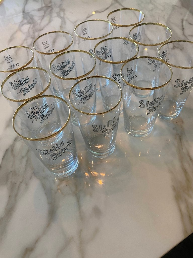 Lot de 12 verres Stella Artois 25 cl – liseré doré, Collections, Enlèvement, Comme neuf, Stella Artois