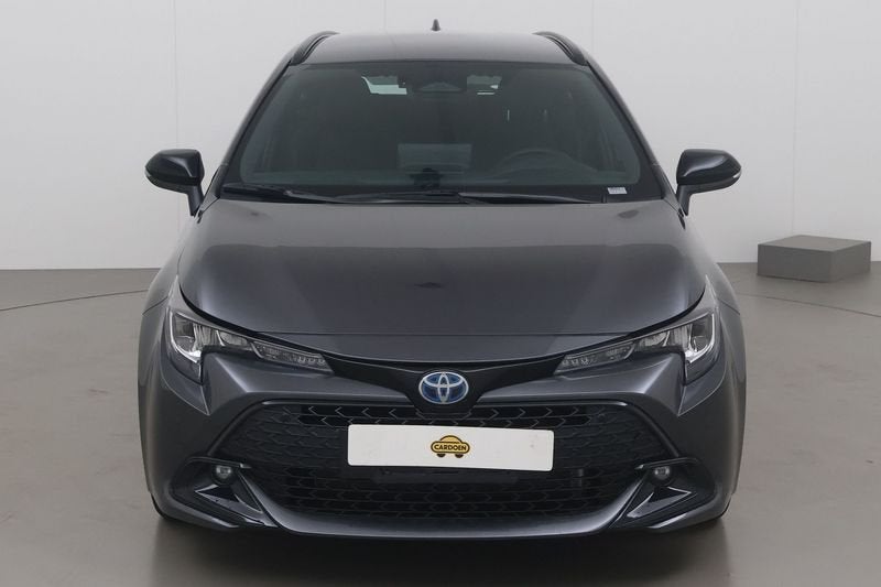 Toyota Corolla SW Hybrid (HEV) 1.8 dynamic e-cvt gpf 140 AT, Auto's, Automaat, Gebruikt, Zwart, 4 cilinders