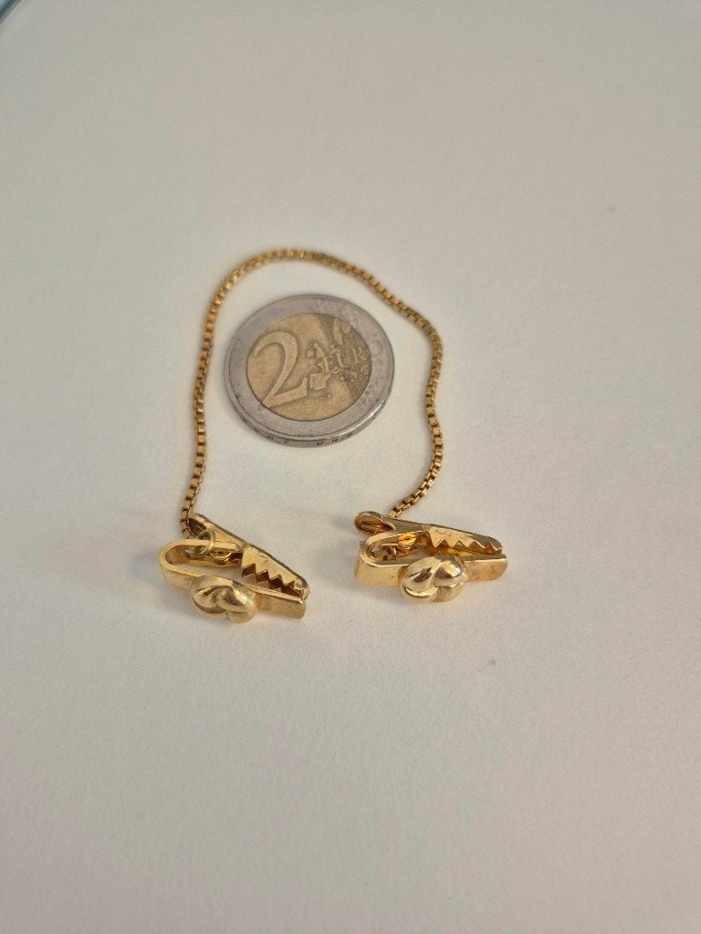 Vintage Swank goudkleurige vestclip met 2 klemmen en ketting, Bijoux, Sacs & Beauté, Bijoux anciens, Enlèvement, Autres matériaux
