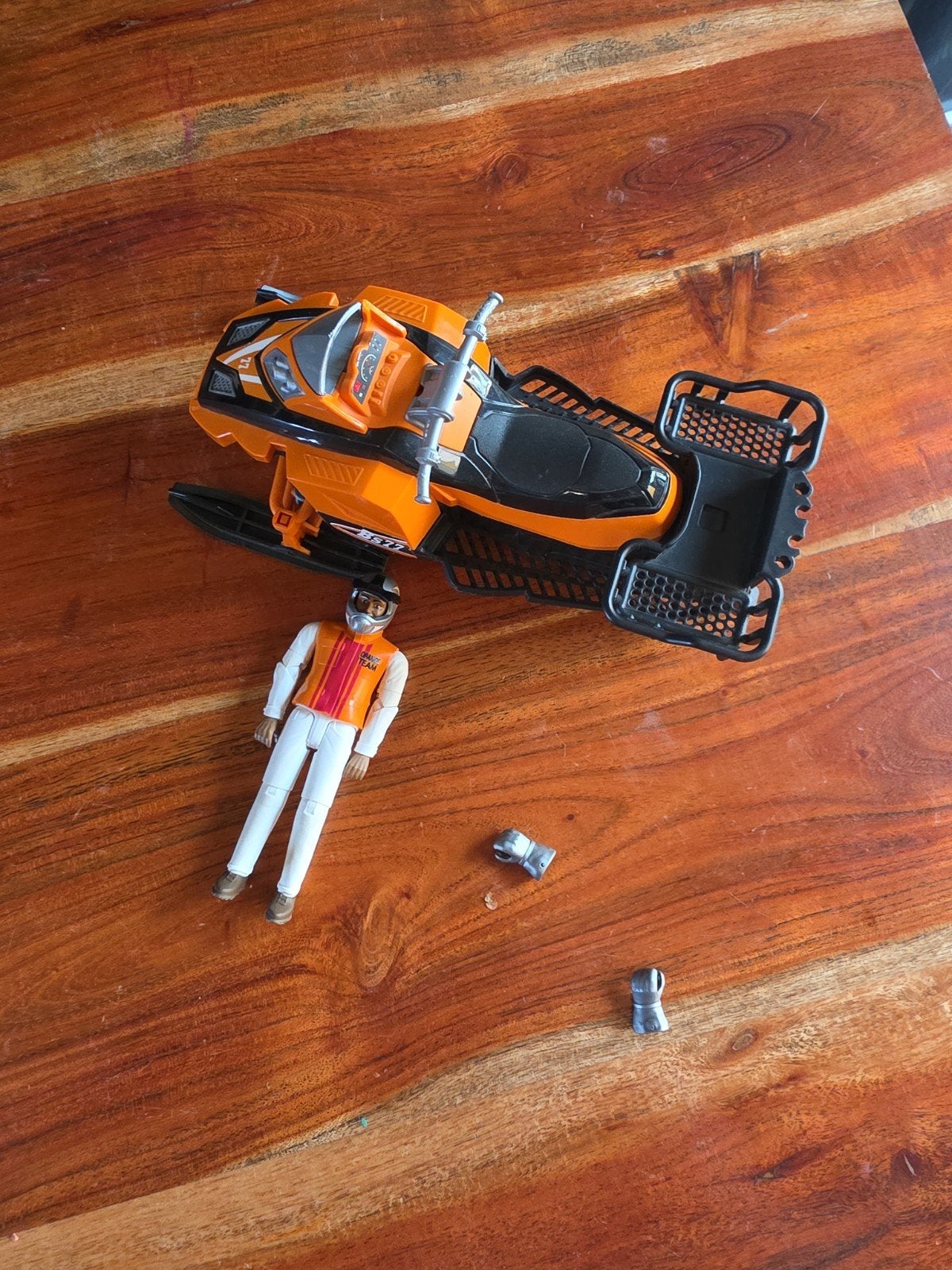 Bruder sneeuwscooter met chauffeur, Ophalen