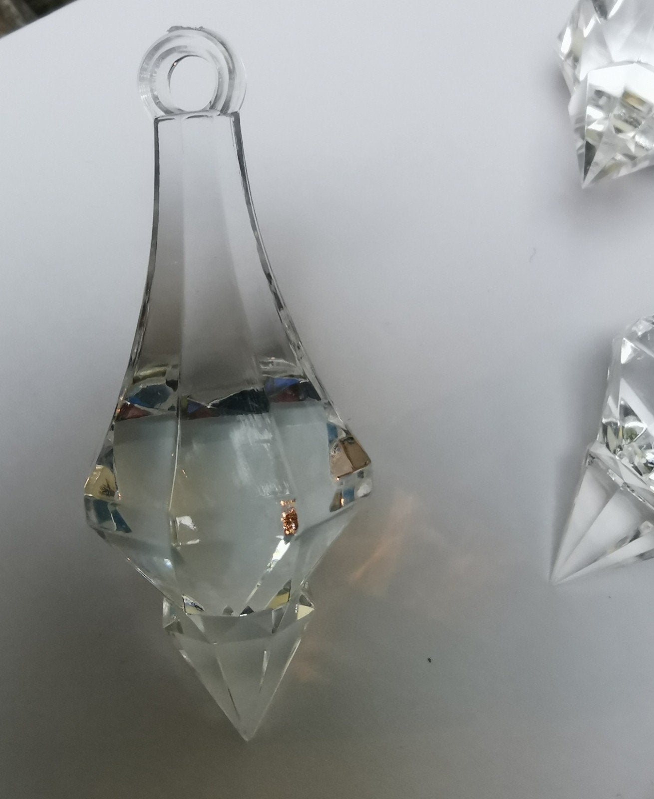 8x Kunststof reserve kristallen voor luchter of kandelaar, Nieuw, Ophalen of Verzenden, Kunststof, Transparant