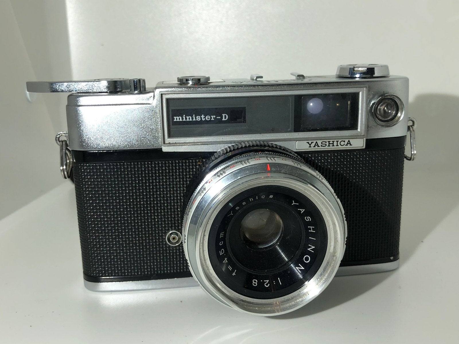 Vintage filmcamera - Yashica Minister-D, Audio, Tv en Foto, Ophalen of Verzenden, Zo goed als nieuw