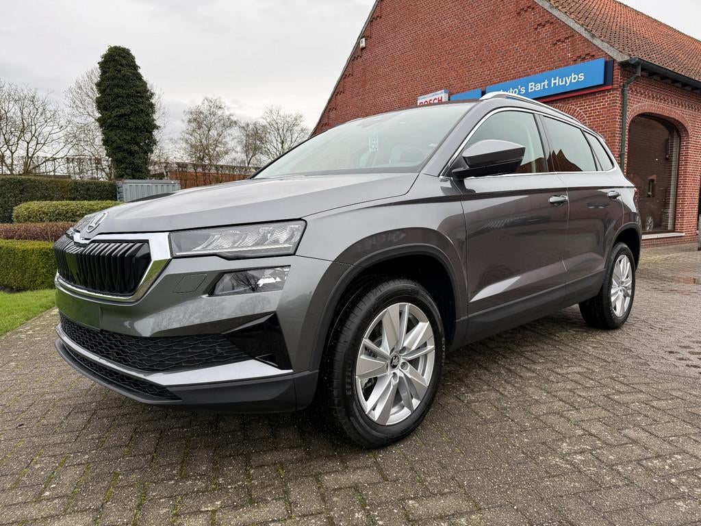Skoda Karoq Family 1.5 TSI DSG - LED / ACC / TREKHAAK / KESS, Auto's, Automaat, Stof, 1498 cc, 700 kg