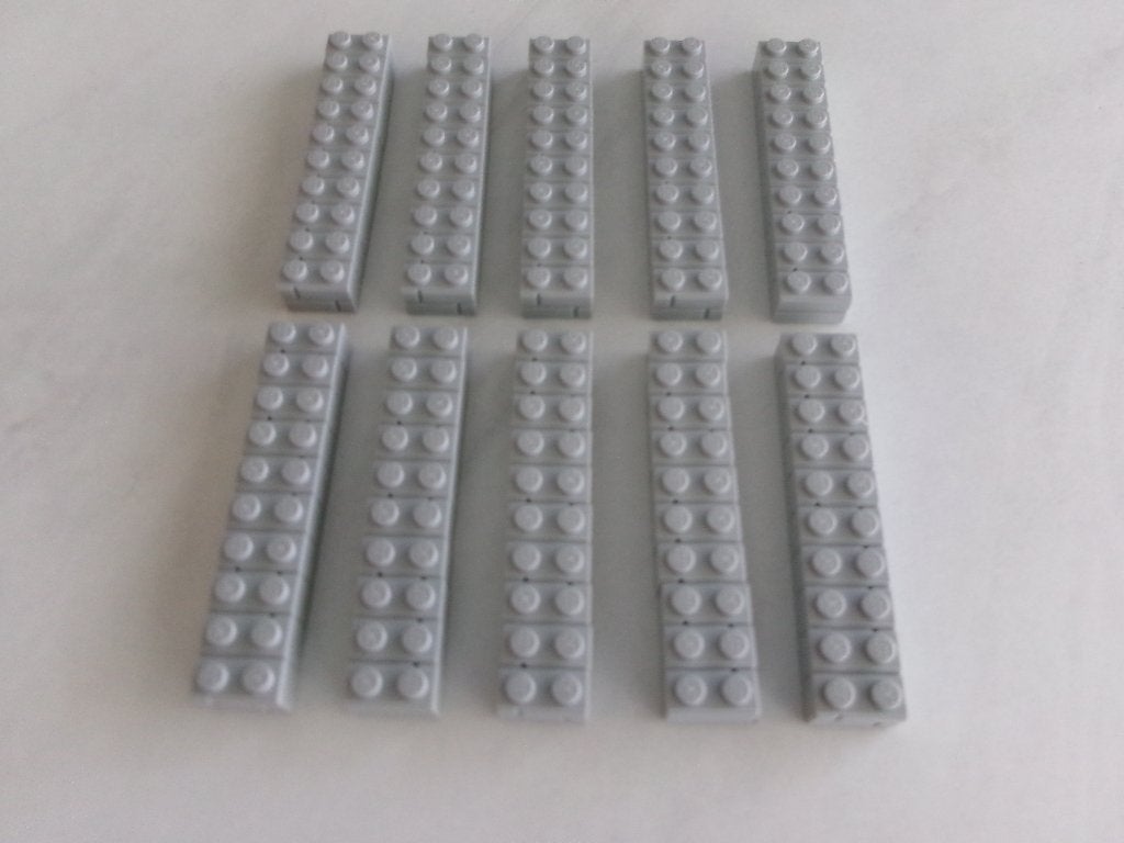 100 lichtblauwgrijze Lego 1 x 2 bakstenen profiel, Gebruikt, Lego, Ophalen of Verzenden, Losse stenen