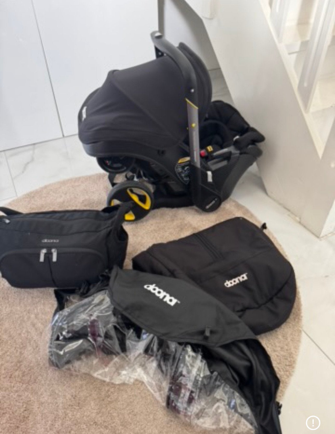 Doona buggy inclusief regenhoes, luiertas en voetenzak, Motoren, Ophalen, Zo goed als nieuw