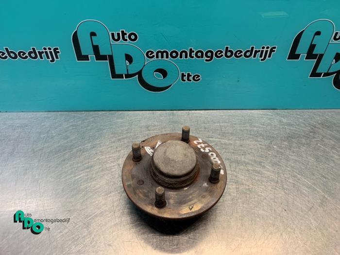 Roulement de roue arrière d'un Nissan Almera (Almera 02-), -, 3 mois de garantie, Utilisé, -