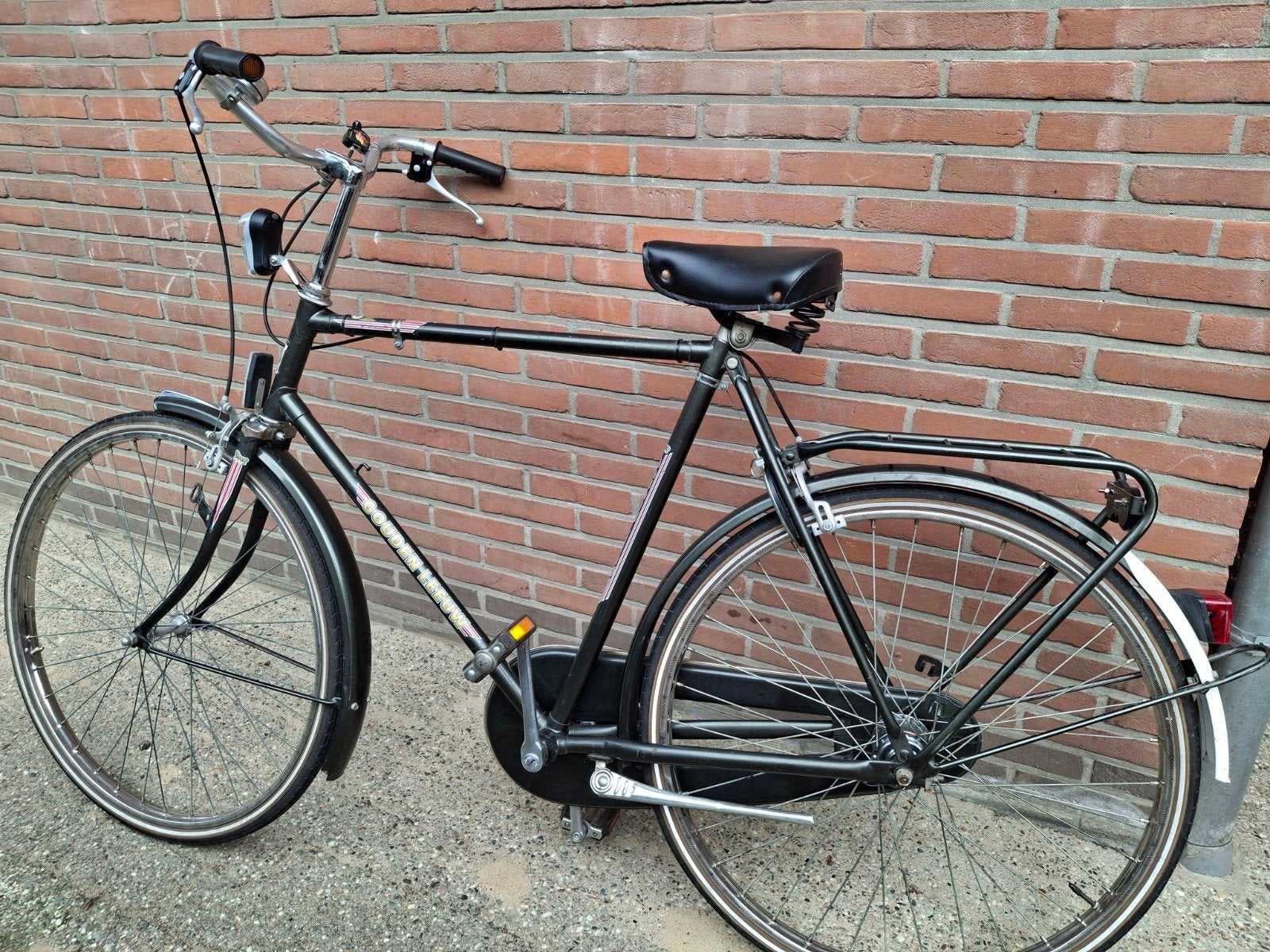 heren fiets m 28, Ophalen