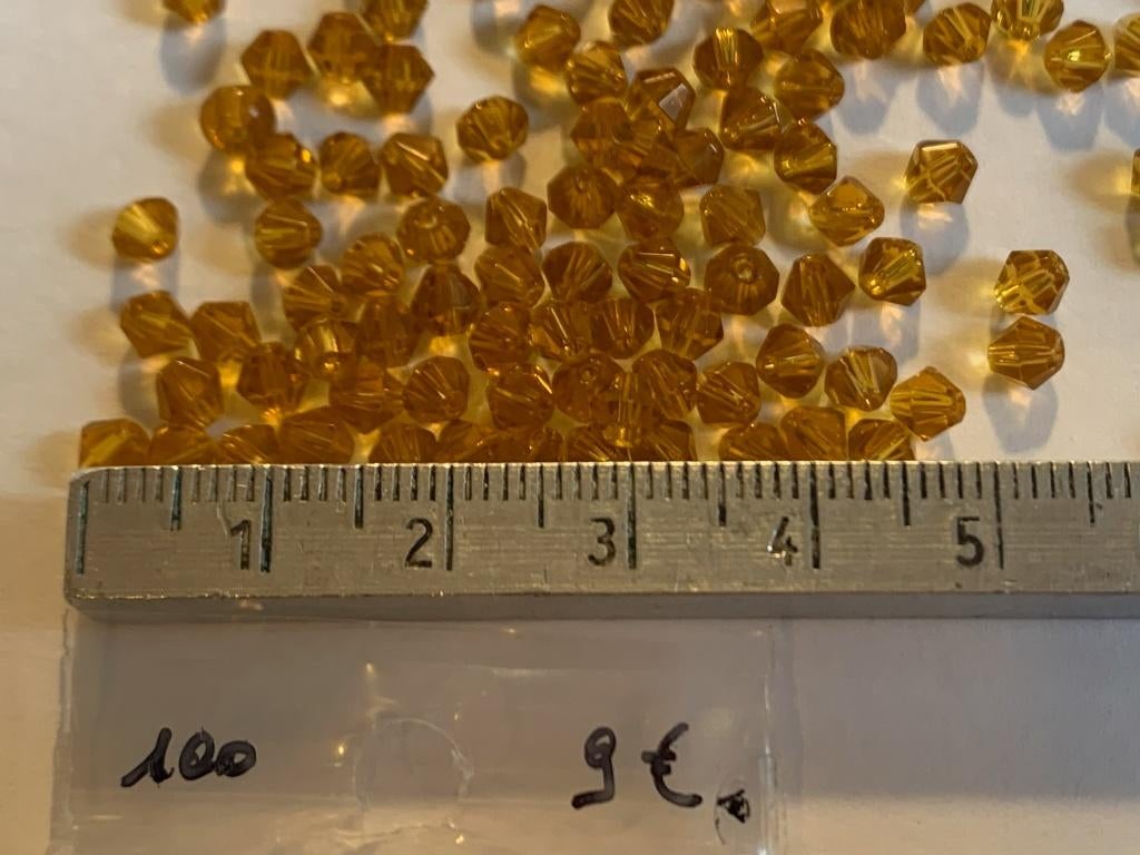 100 Swarovski tolletjes lichtbruin, Ophalen of Verzenden, Nieuw, Kraal