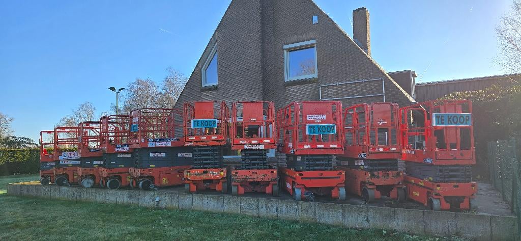 Elektrische schaarliften 7.8m tot 13.7m werkhoogte te koop, Ophalen of Verzenden, Gebruikt