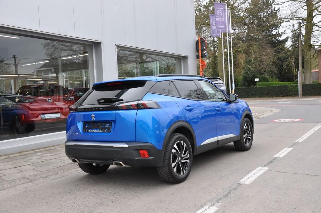 Peugeot 2008 Allure Pack (bj 2023, automaat), Auto's, Lichtsensor, Stof, Gebruikt, 1199 cc