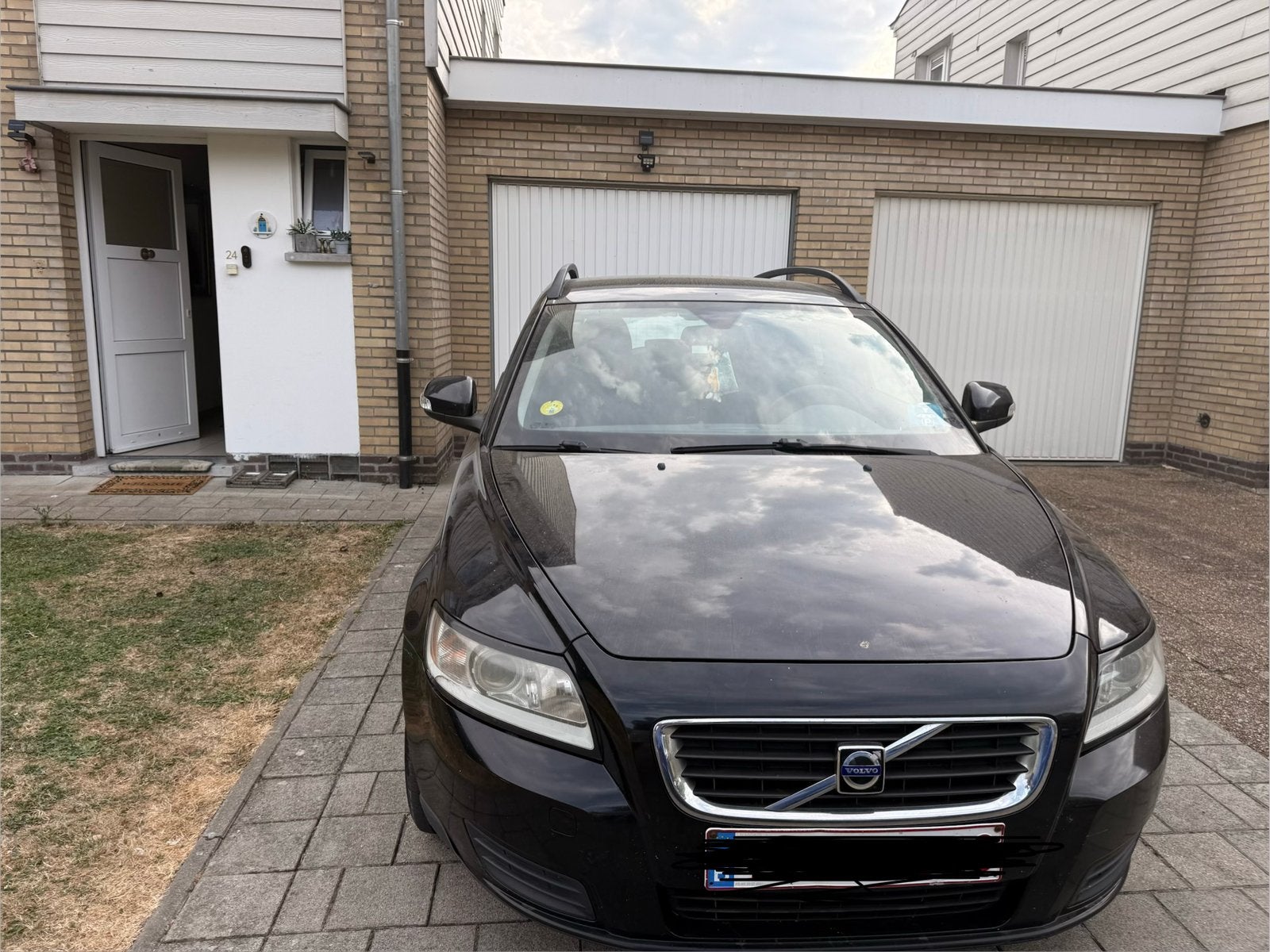 Volvo V50 1.6D Manueel (2010) te koop, Auto's, Voorwielaandrijving, Euro 5, Zwart, Leder en Stof