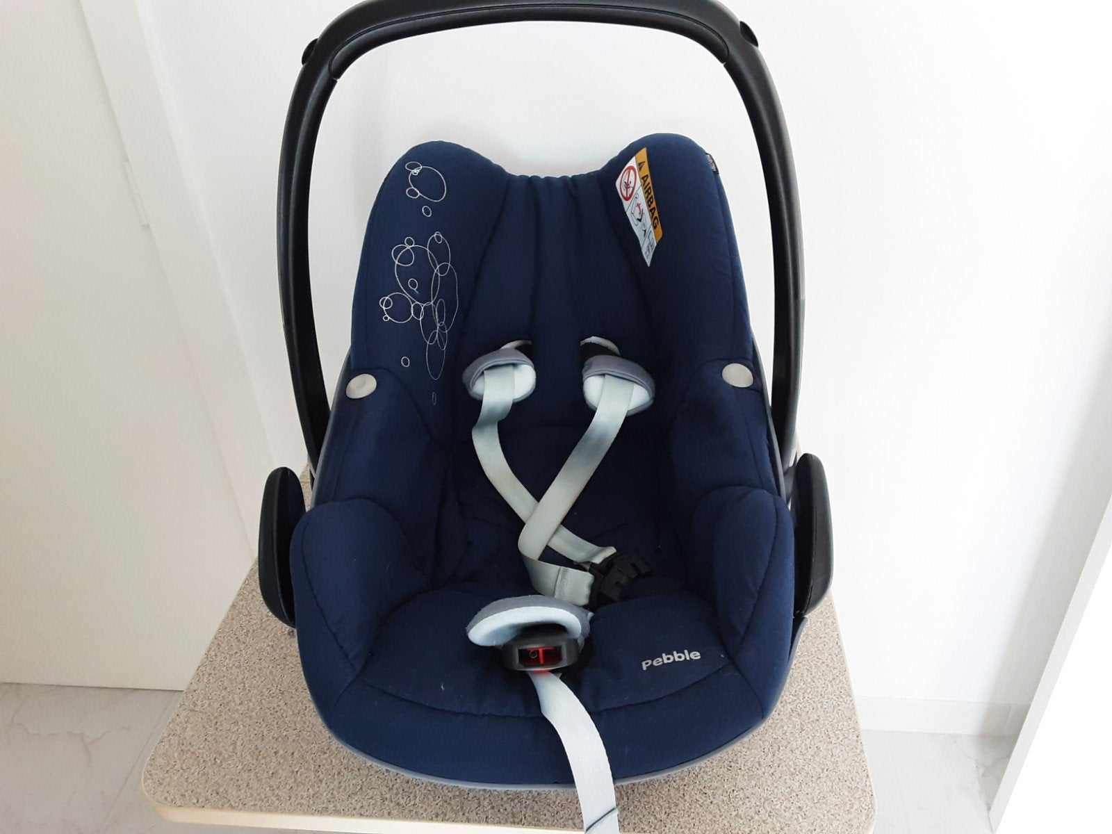 Maxi cosi, autostoeltje, Ophalen