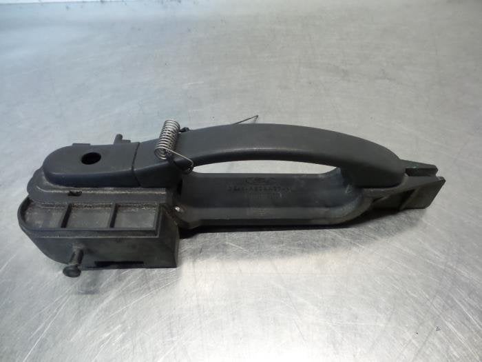 Poignée portière 4portes avant gauche d'un Ford Fiesta (Fi, -, 3 mois de garantie, -, -