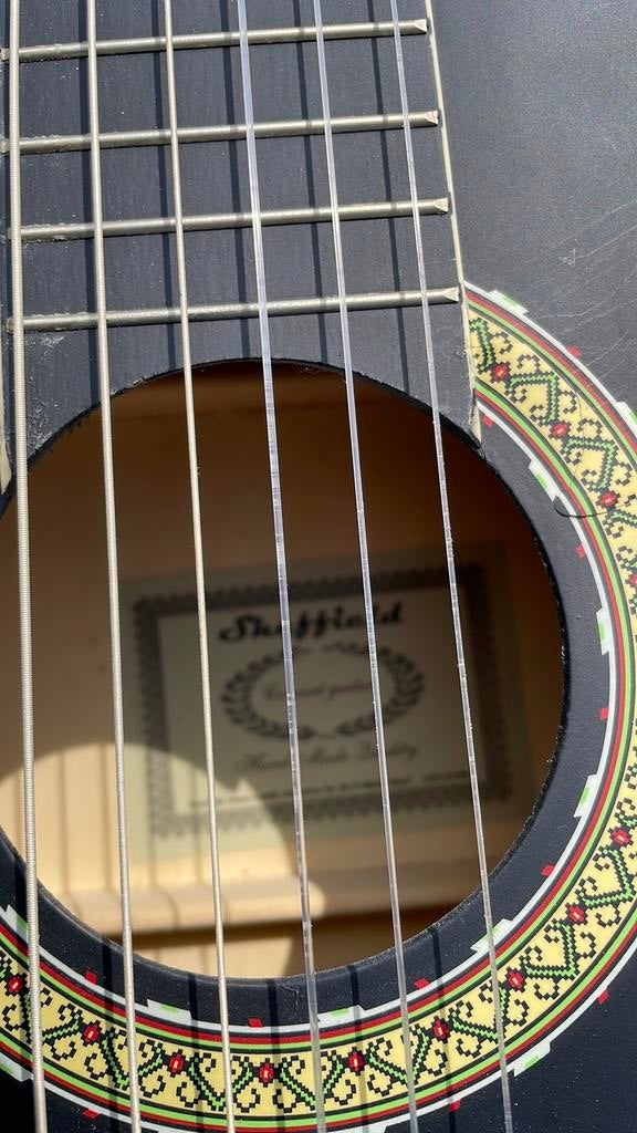 Gitaar, Ophalen, Zo goed als nieuw