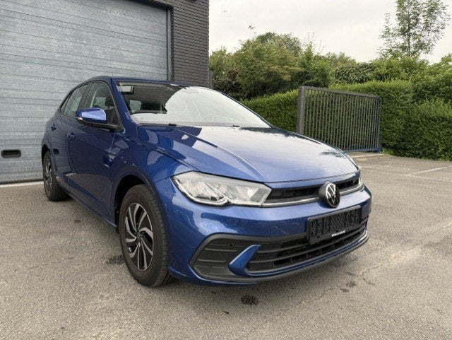 Volkswagen Polo 1.0 TSI DSG AdapCruise App Camera Trekhaak, Auto's, Volkswagen, Stof, Blauw, 127 g/km, 5 deurs