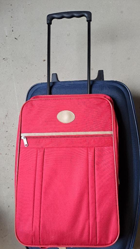 Rood / Roze reiskoffer, Ophalen, Wieltjes