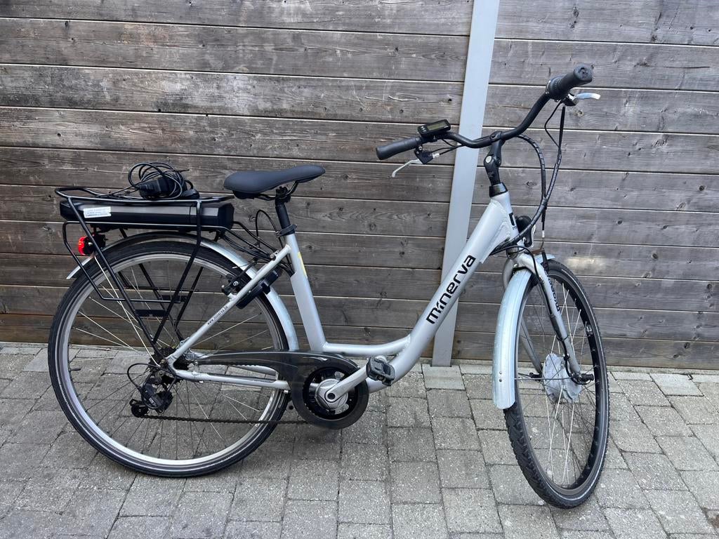 Elektrische dames fiets minerva, Fietsen en Brommers, 47 tot 51 cm, Ophalen, Gebruikt, 50 km per accu of meer