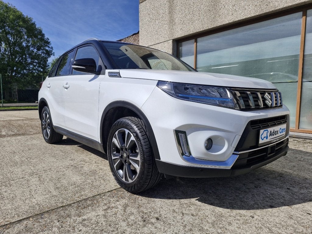Suzuki Vitara 1.4 Benzine 2022 / 1 Jaar Garantie, Auto's, Voorwielaandrijving, Stof, 4 cilinders, Wit