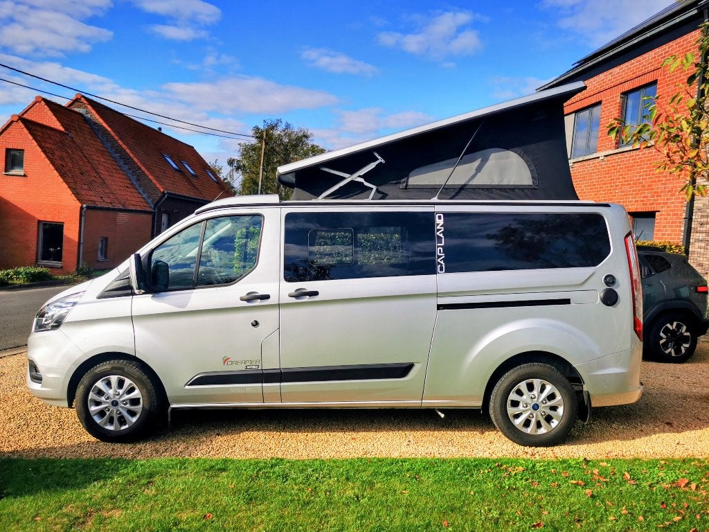Dreamer CapLand Ford 170PK, 8traps Automaat, Caravans en Kamperen, Automaat, Buscamper of Camperbus, Ford, 7 tot 12 maanden geleden