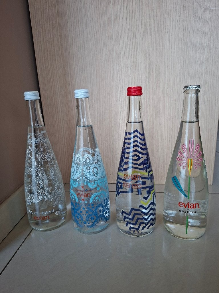 4 limited edition ongeopende Evian waterflessen, Ophalen of Verzenden, Nieuw, Overige typen