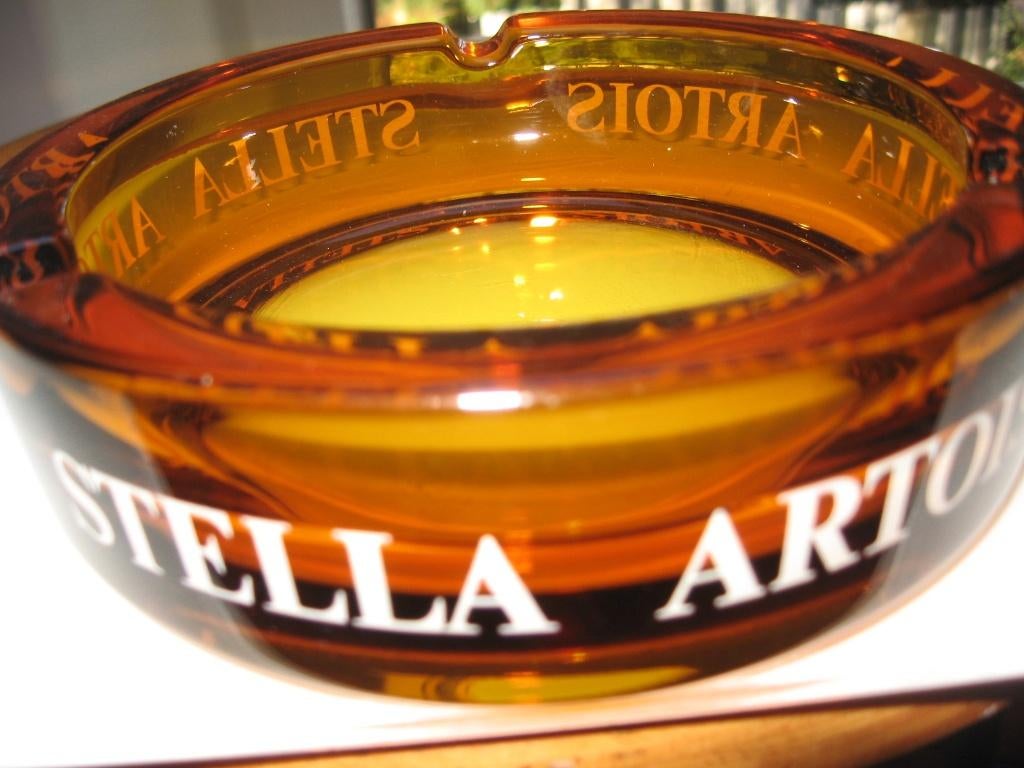 STELLA ARTOIS asbak in stevig rookglas., Verzamelen, Merken en Reclamevoorwerpen, Nieuw, Overige typen, Ophalen of Verzenden