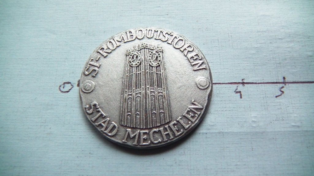 médaille stad mechelen 1982, Enlèvement