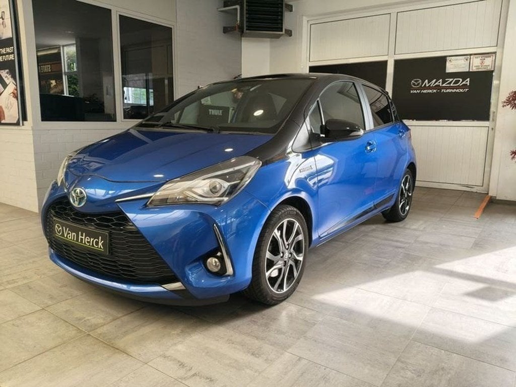 Toyota Yaris 1.5i VVT-i Hybrid Two tone, Automaat, https://public.car-pass.be/vhr/5c96de78-59a9-42aa-89ed-859699365093, Blauw