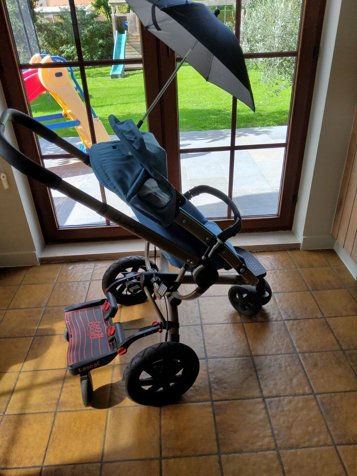 Kinderbuggy met meeloopplankje, Enlèvement, Quinny