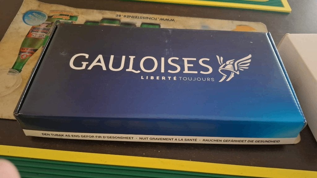 Gauloises aansteker + asbak + beschermhoes pakje Nieuw, Verzamelen, Rookartikelen, Aanstekers en Luciferdoosjes, Ophalen of Verzenden