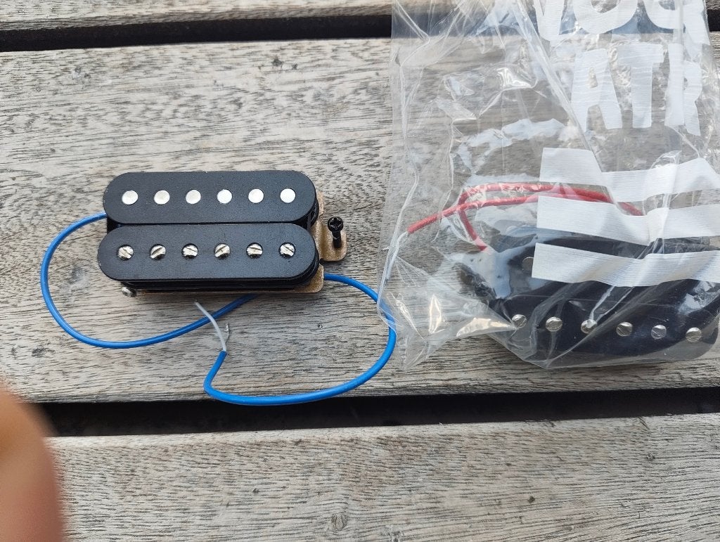 Zwarte humbucker set (2x, nek + brug) ongebruikt, Ophalen of Verzenden, Nieuw, Elektrische gitaar