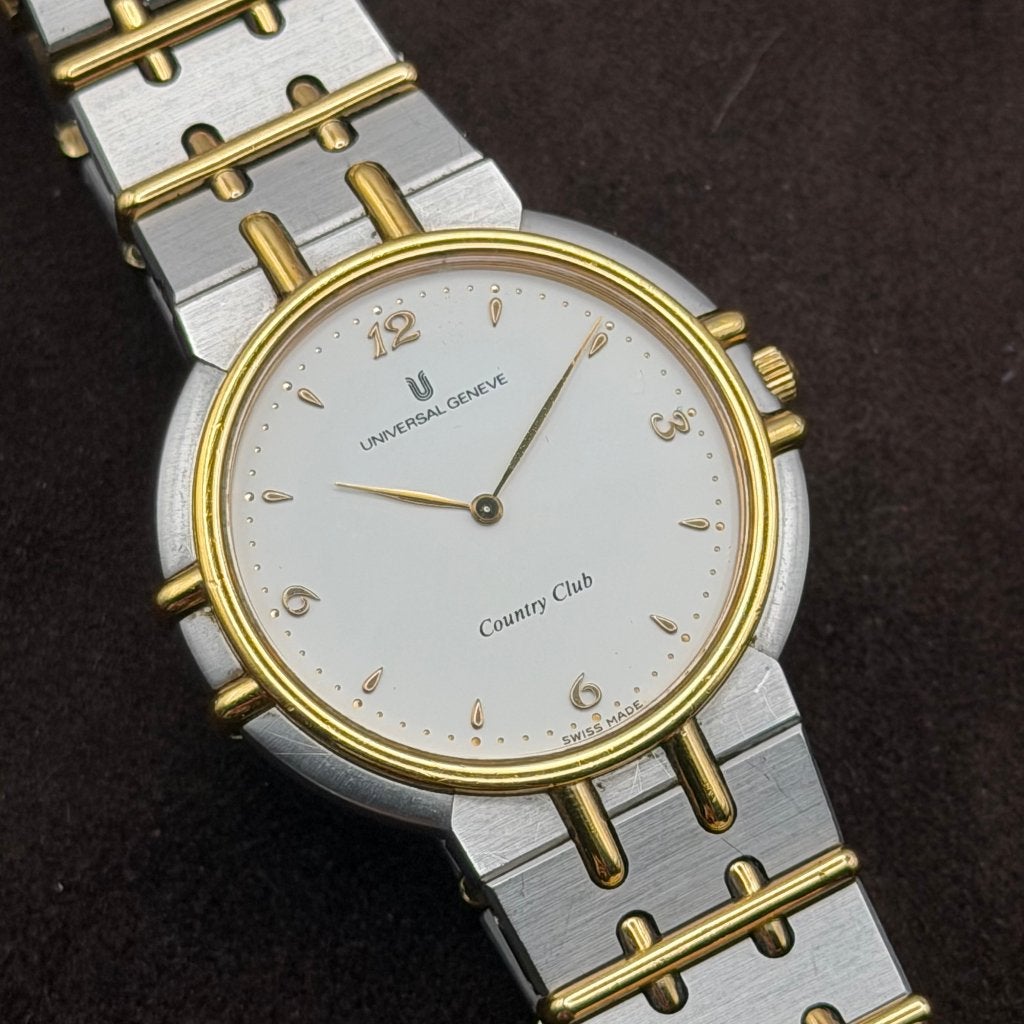 Universal Genève Country Club - jaren '80 - heel zeldzaam, Handtassen en Accessoires, Horloges | Antiek, Staal, Polshorloge, Verguld