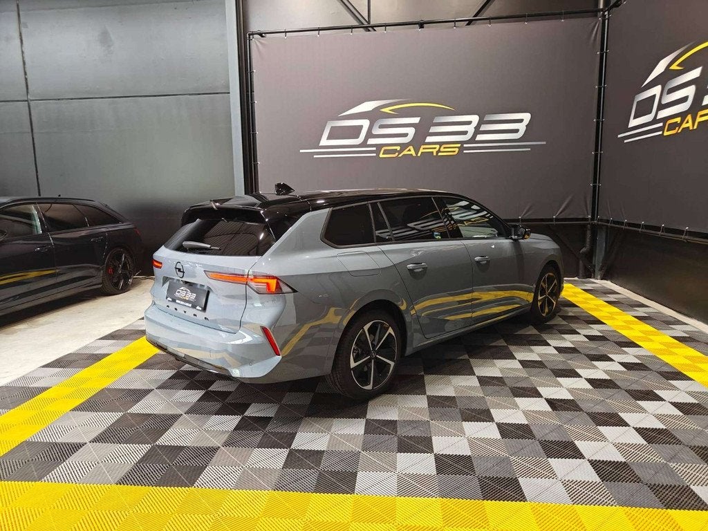 Opel Astra Sports Tourer 1.2 Turbo GS /LED/360/Keyless/Adapt, Auto's, Opel, Gebruikt, Zwart, 1199 cc, https://public.car-pass.be/vhr/7dd4db8f-b4ee-44f0-8651-a75fd47a471a