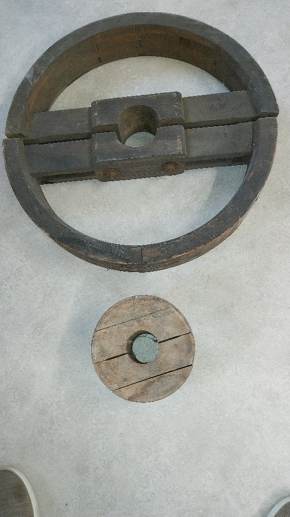 antieke houten poelies, Ophalen