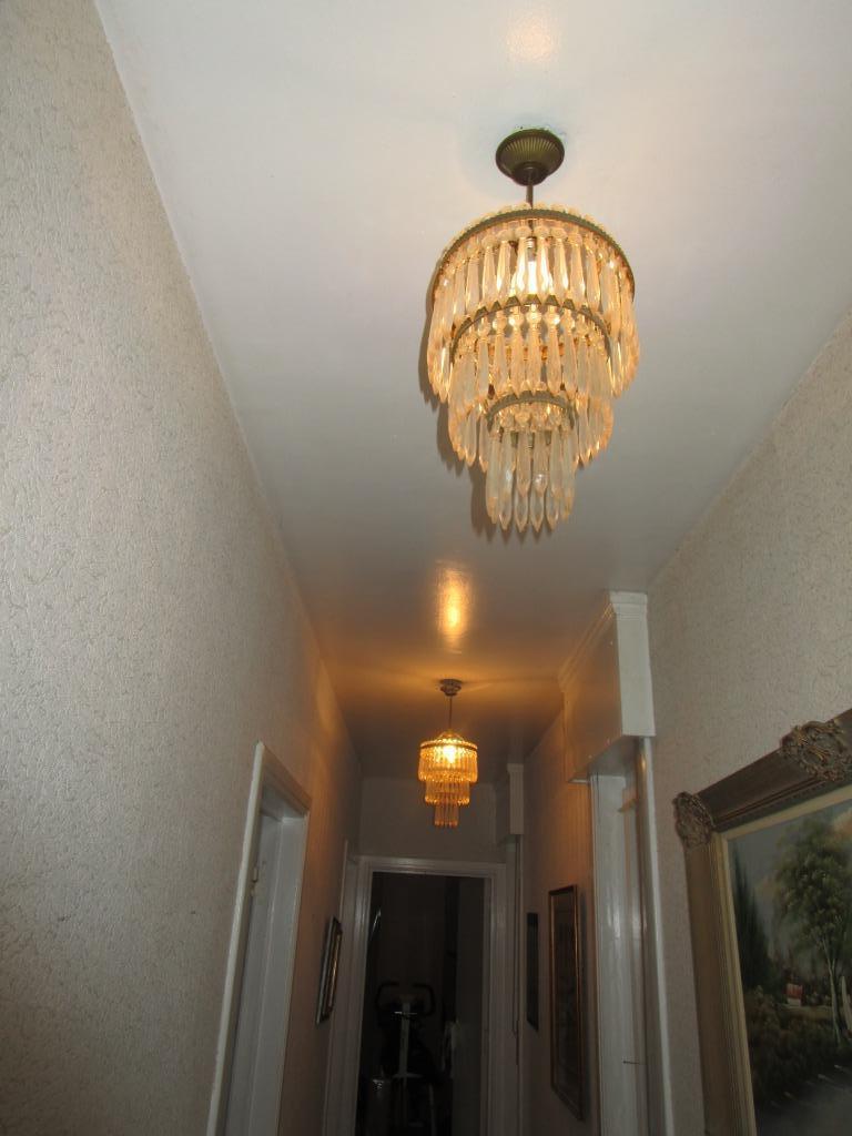 lustre a pampilles, Envoi, Comme neuf