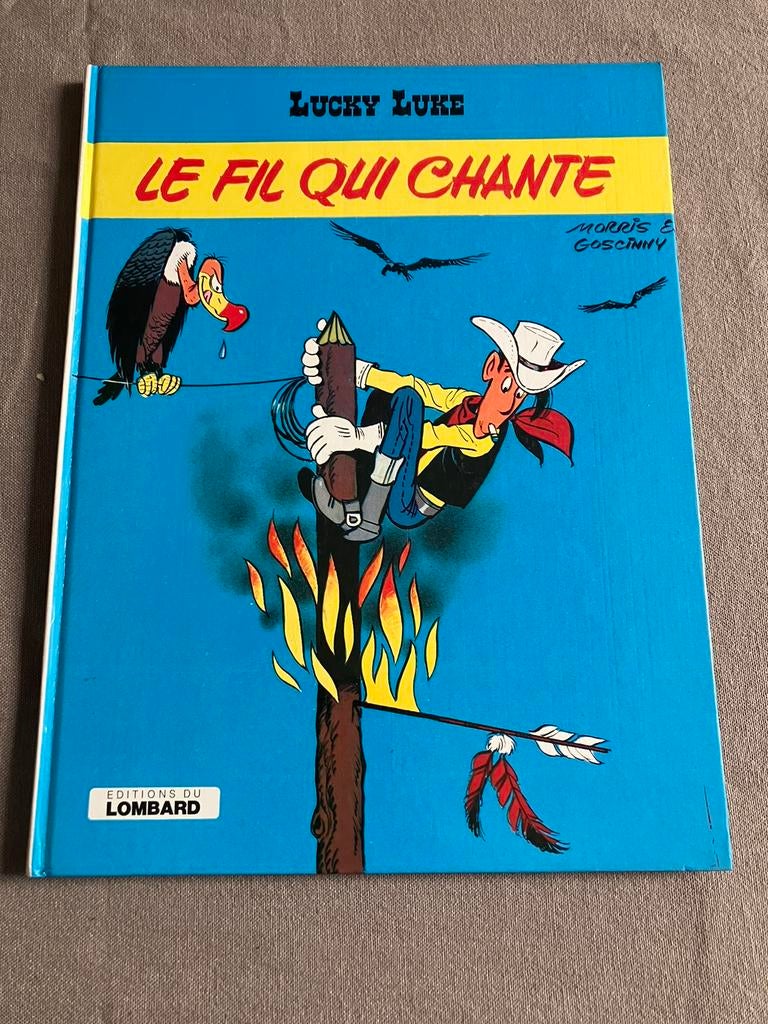 Lucky Luke T46 - le fil qui chante - EO du Lombard 1977., Enlèvement ou Envoi, Une BD, Comme neuf, Morris
