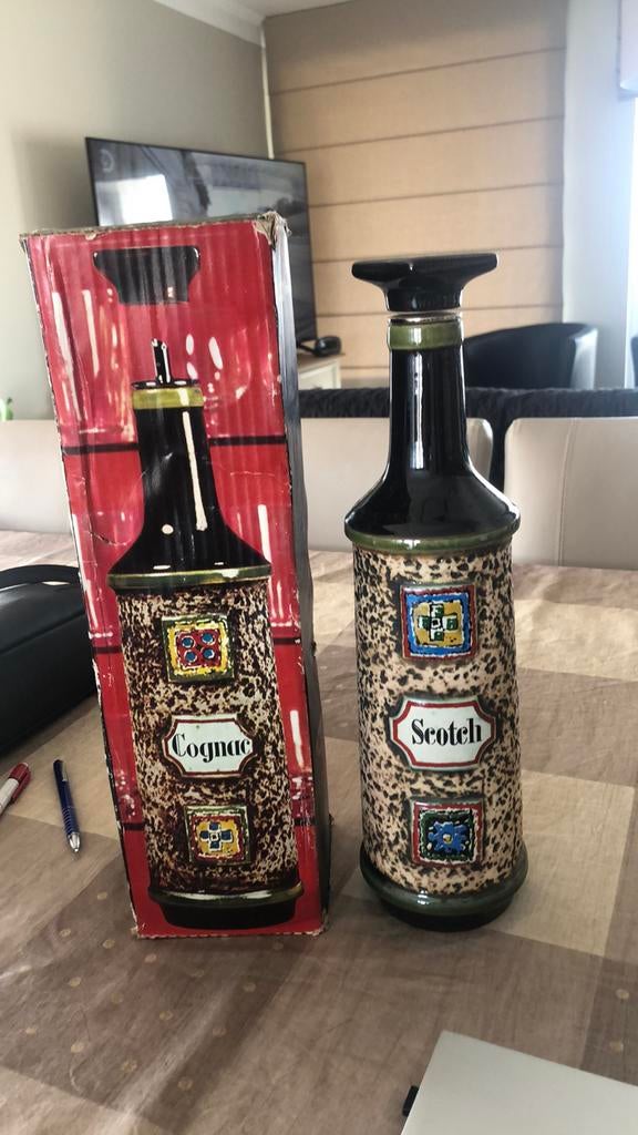 Fles in steen voor sterke drank, Enlèvement
