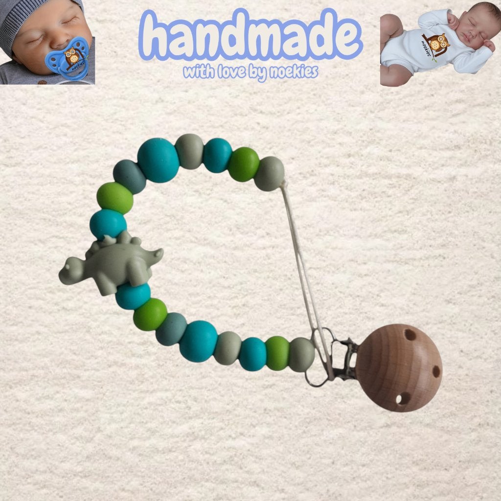 noekies Speenkoord dino turquoise khaki nr 27, Kinderen en Baby's, Kraamcadeaus en Geboorteborden, Verzenden, Nieuw, Kraamcadeau
