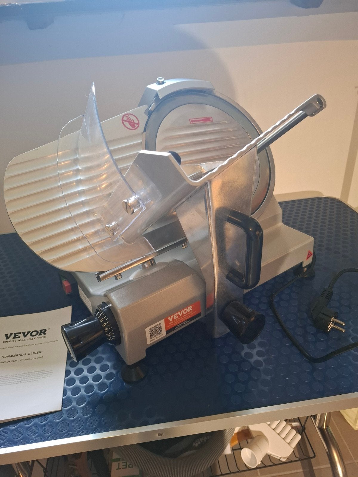 Commerciële vleessnijmachine, Ophalen