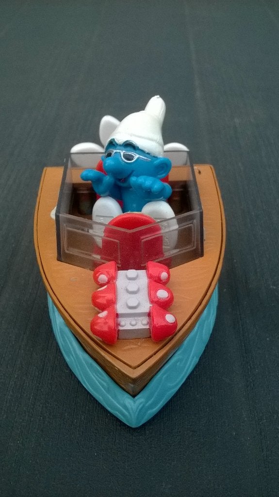 Smurf in speedboot – Toy Island, Verzamelen, Smurfen, Ophalen of Verzenden, Gebruikt, Overige Smurfen, Poppetje, Figuurtje of Knuffel