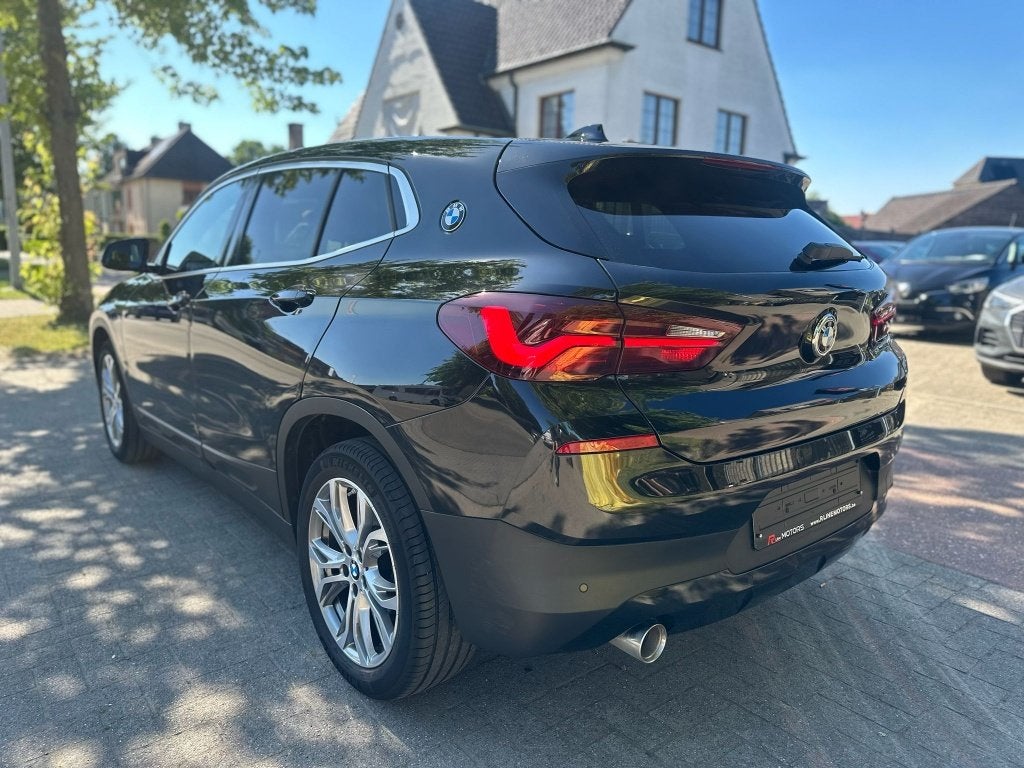 BMW X2 sDrive18 - Automaat - 36.360KM - Sportzetels - Xenon, Auto's, BMW, 4 deurs, X2, Zwart, Leder